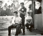 1310-51452 Job Corps Haircut Session - Sam Houston National Forest 1966 by United States Forest Service